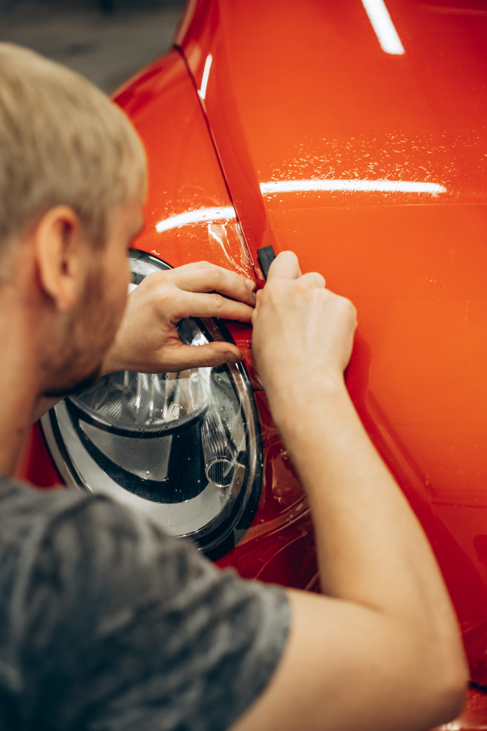 Car wrapping with foil at car service